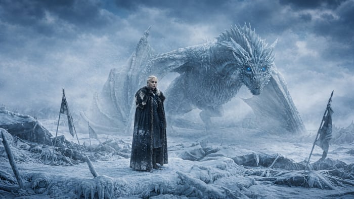 Daenerys and her ice dragon in a snowy landscape
