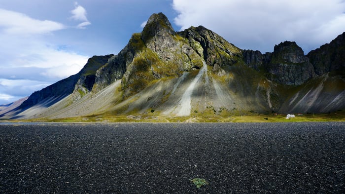 Iceland Mountain And Black Sand Beach