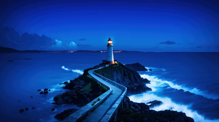 Lighthouse on rocky shores at night