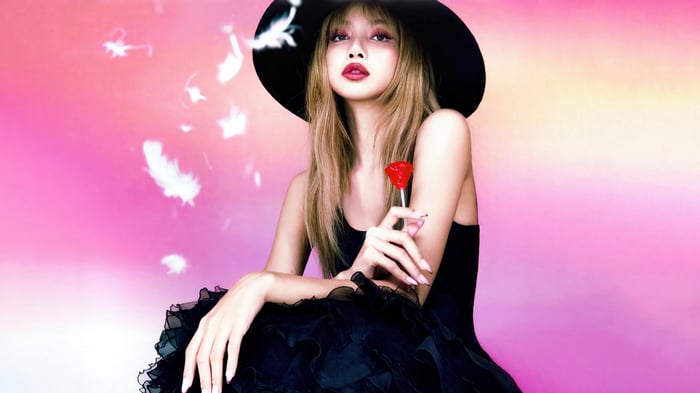 Lisa from BLACKPINK with a lollipop