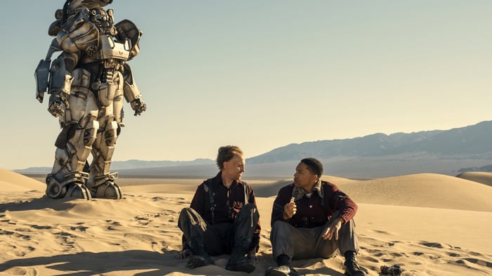Fallout Series: Power Armor and two men in desert