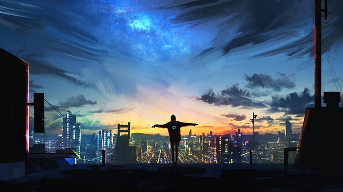 Man on rooftop overlooking city at sunrise with stars