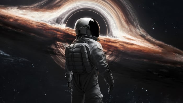 Astronaut facing a black hole in space 4K