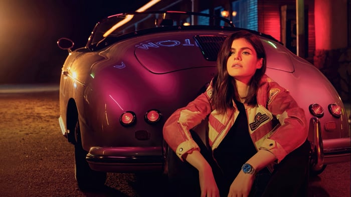 Alexandra Daddario Poses by a Vintage Car