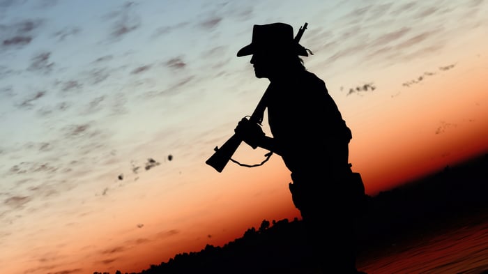 Red Dead Redemption 2 Silhouette with Rifle at Sunset