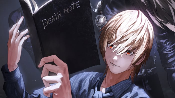 Light Yagami holding the Death Note