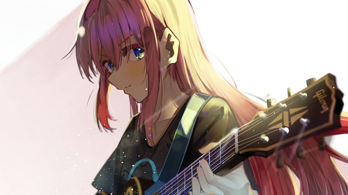 Hitori Gotoh playing a guitar