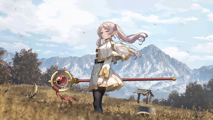 Frieren in a field with mountains in the background
