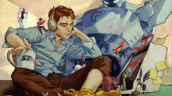 Man with headphones and mug near a mech and video game
