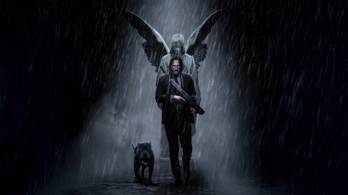 John Wick with Dog and Angel Statue in Rain 4K