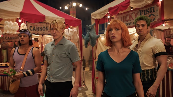 One Piece: Nami, Sanji, Usopp, and Zoro at a Carnival