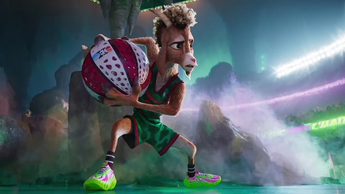 Goat holding a basketball in a stadium