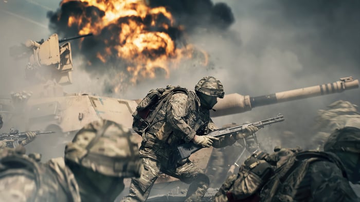 Battlefield 6 soldiers in combat with tank and explosion