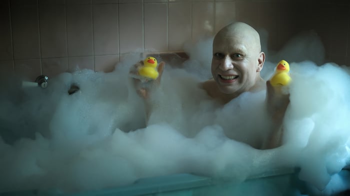 Uncle Fester in a bubble bath with rubber ducks 4K