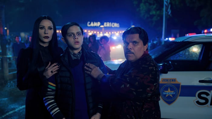 Morticia, Pugsley, and Gomez Addams at Camp Jericho