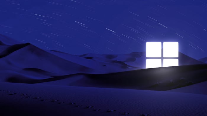 Windows 11 logo in a desert at night
