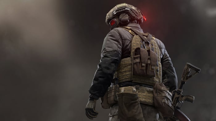 Soldier in tactical gear with rifle