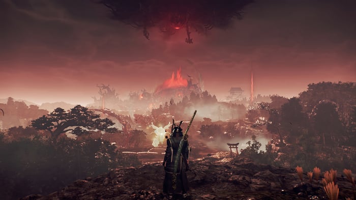 Samurai in a fiery landscape with a demon overhead
