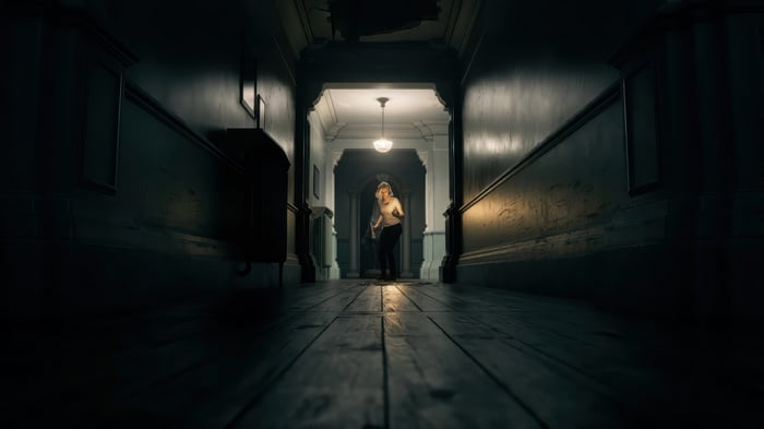 Grace Ashcroft in a dark hallway, Resident Evil Requiem 4K