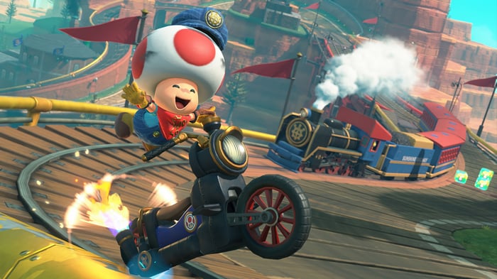 Toad racing a motorcycle in Mario Kart World 4K