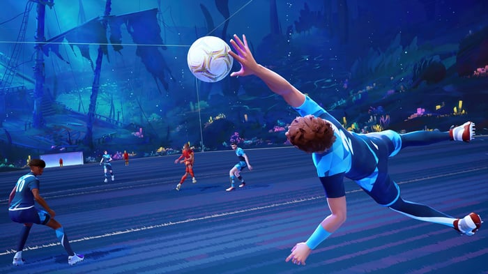 Soccer players in a futuristic underwater stadium