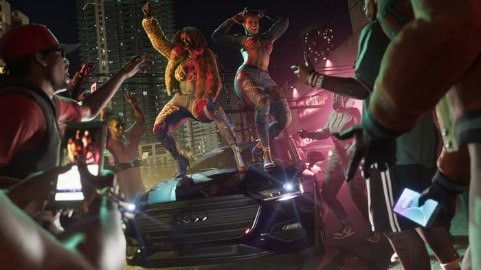 Grand Theft Auto 6: Two women dancing on a car at night