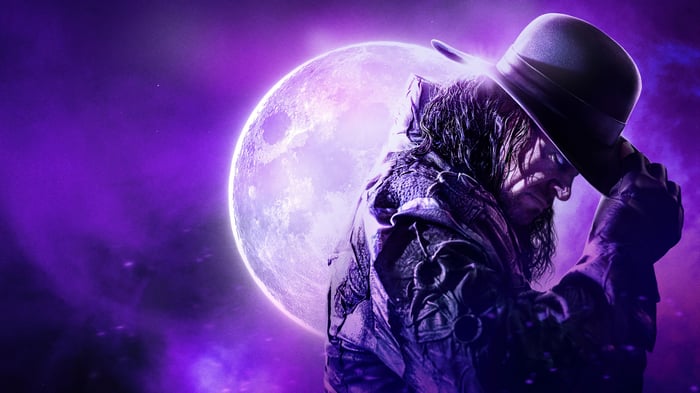 The Undertaker in front of a large moon