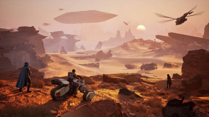 Dune: Awakening desert landscape with vehicles and aircraft