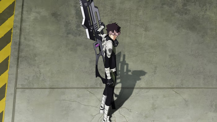 Gen Narumi from Kaiju No. 8. holding a large weapon