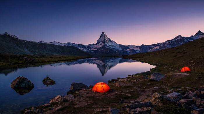 Camping by a lake with Matterhorn mountain reflection