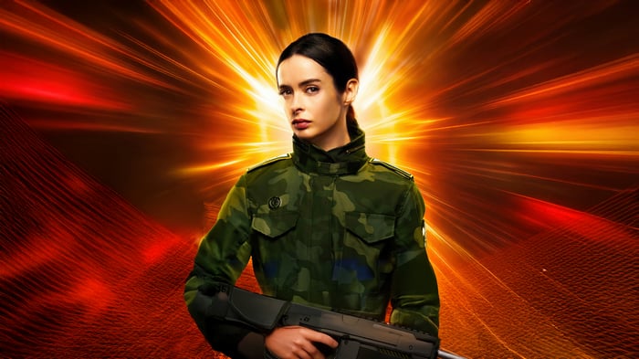 Krysten Ritter in a Military Uniform Holding a Rifle