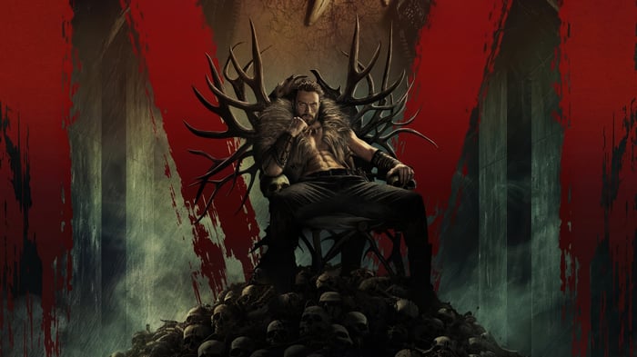 Kraven the Hunter sitting on a throne of skulls