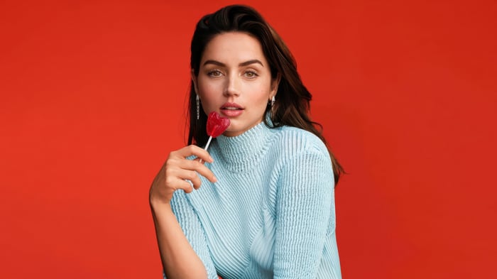 Ana de Armas with a heart-shaped lollipop