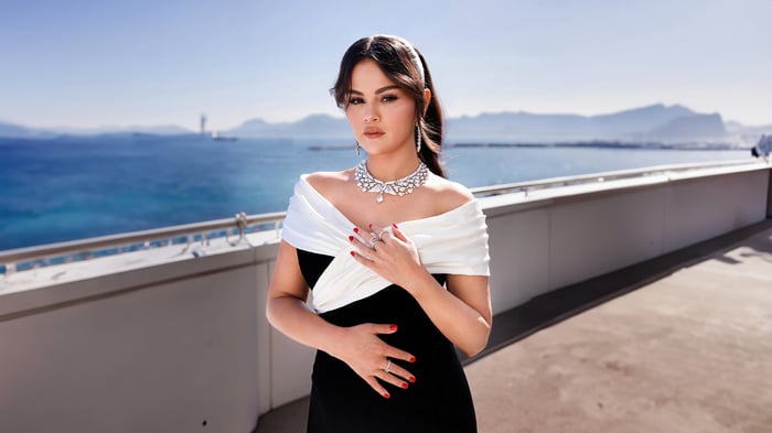Selena Gomez in a black and white dress with jewelry