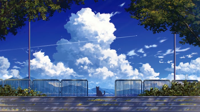 Cat sitting on steps with clouds and trees