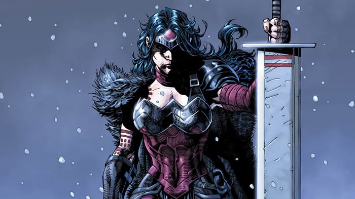 Wonder Woman holding a sword in the snow