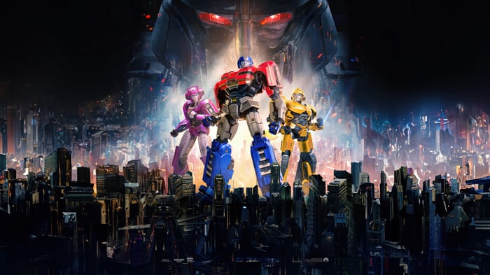 Transformers One: Optimus Prime, Elita-1, and Bumblebee in a city