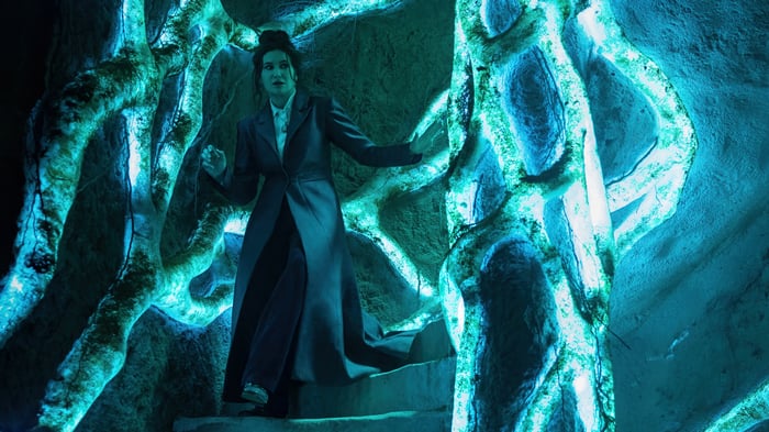 Agatha Harkness in a glowing blue environment 4K