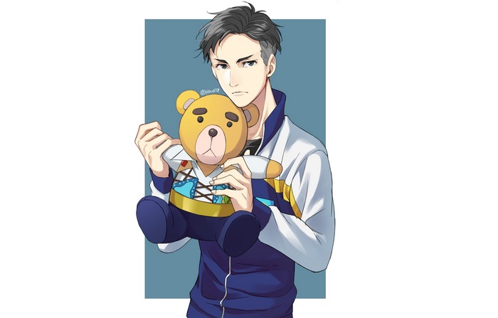 Otabek Altin holding a teddy bear