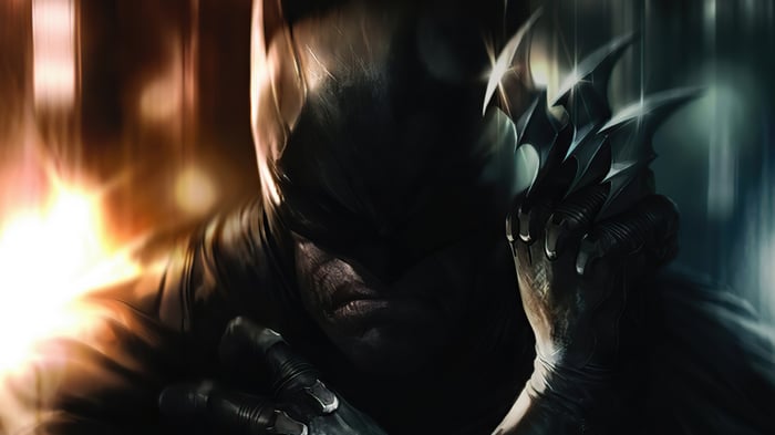 Batman holding a Batarang in 4K