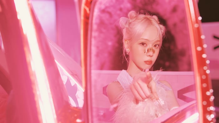 Aespa Winter in a pink, futuristic setting