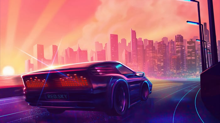 Retro Car Driving Through a Futuristic City at Sunset