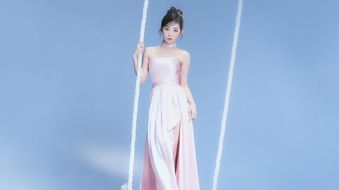 Irene from Red Velvet on a swing
