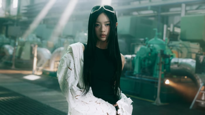 Hanni from NewJeans in a factory setting