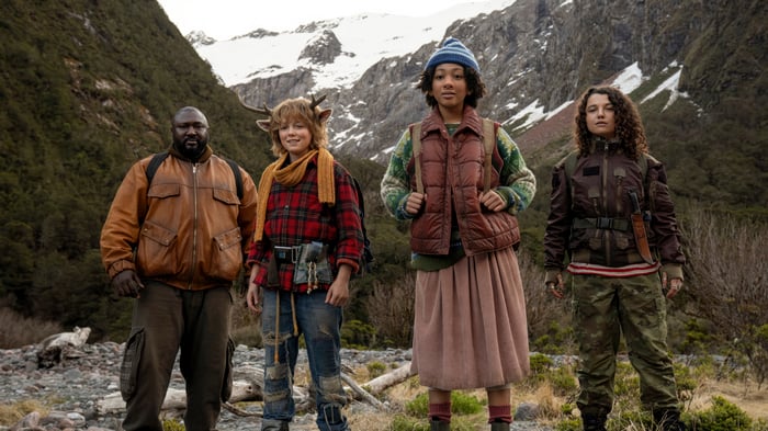 Sweet Tooth: Four characters in a mountain landscape