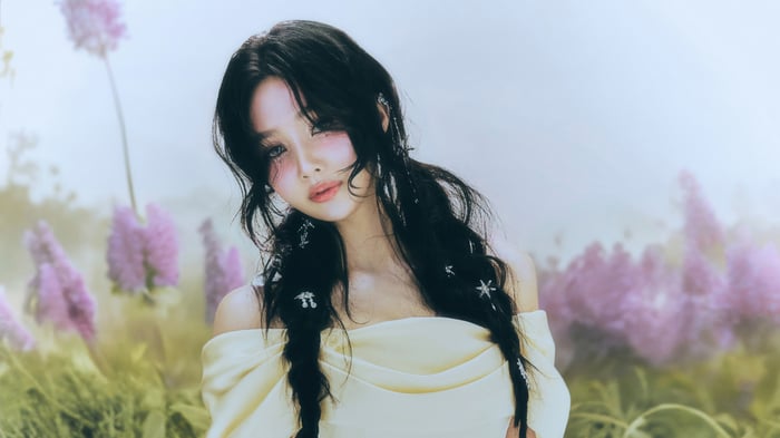 Joy from Red Velvet in a field of flowers