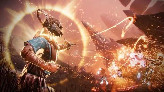 Destiny 2 Guardian casting a spell with golden light
