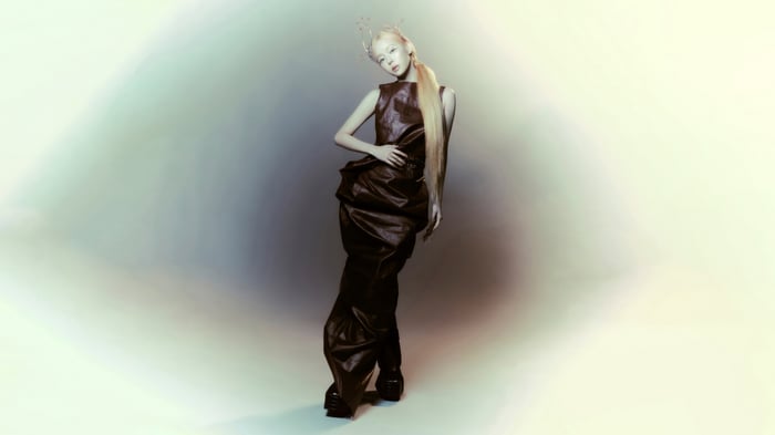 Aespa Winter in a dark avant-garde dress