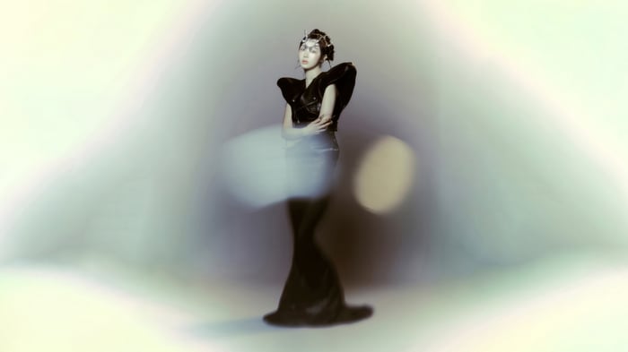 Giselle from Aespa in a black avant-garde outfit
