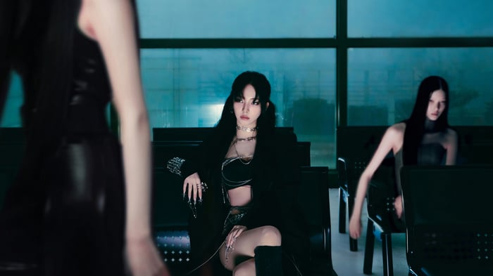 Aespa Karina and members in dark outfits